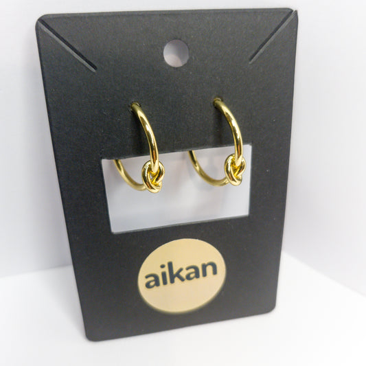 Aros Argolla Nudo Oro Laminado 18K✨️